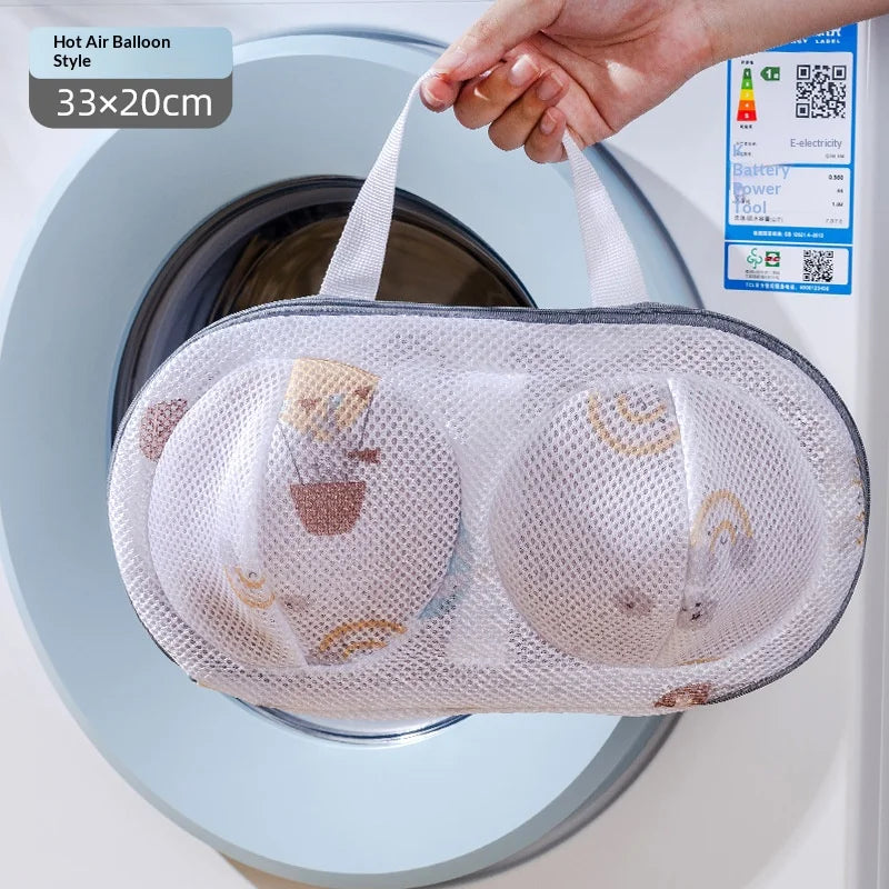 A mesh laundry bag for delicates is shown inside a washing machine drum.