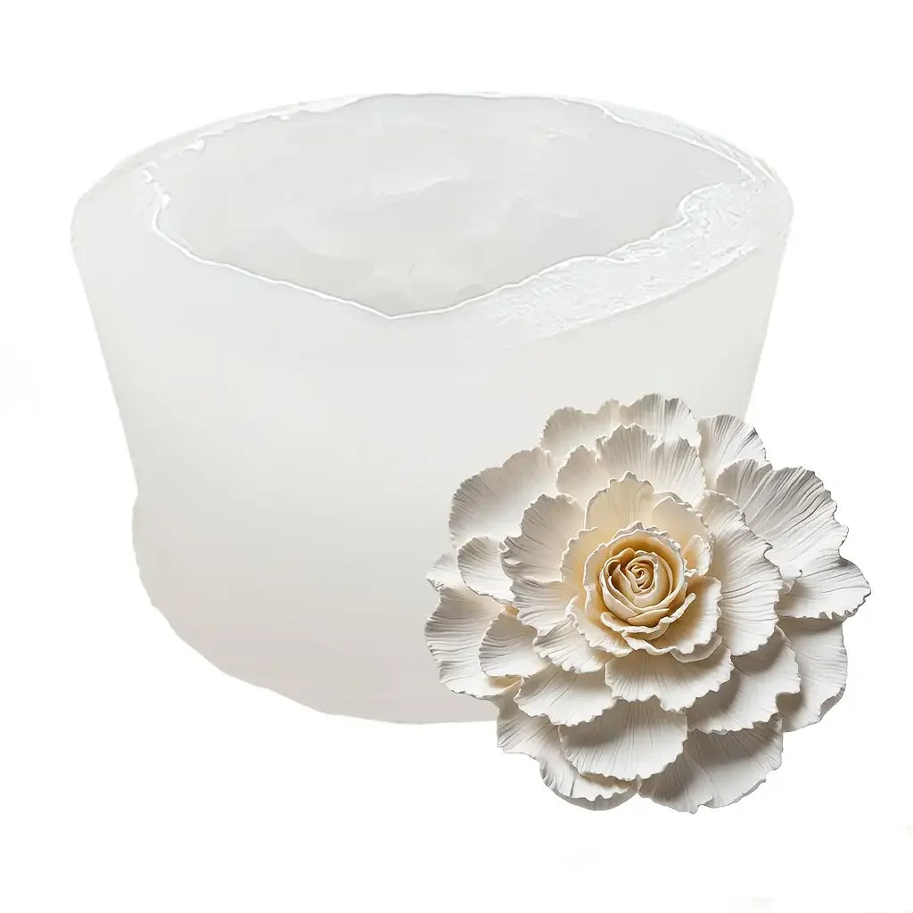 A white silicone mold shaped like a fully bloomed rose for crafting candles, soap, and resin.