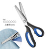 A pair of black and blue professional pinking shears with stainless steel blades shown next to a piece of fabric.