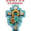 A wooden cross decorated with a sunflower and roses, featuring flowing script on a light blue background.