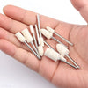 A hand holds several wool felt polishing wheels with metal shafts for rotary tools.