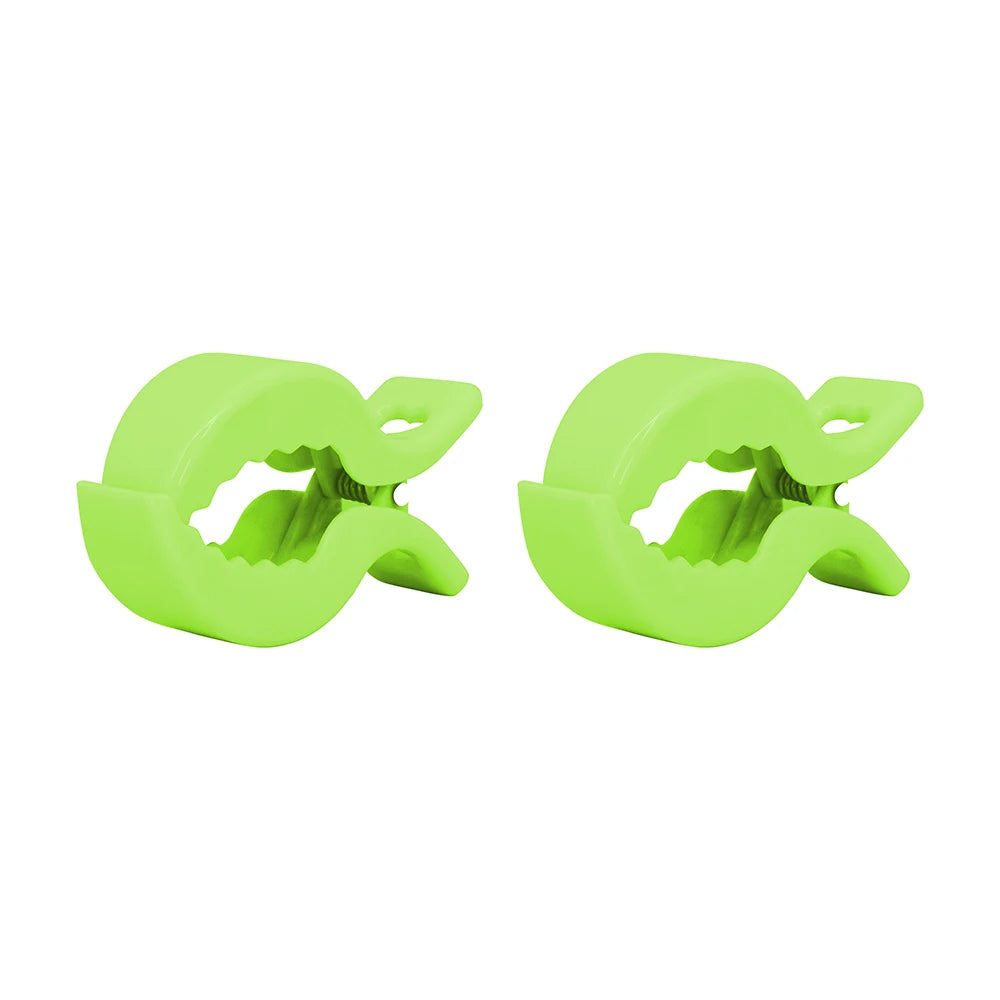 A pair of bright lime green stroller blanket clips, designed as universal holders for prams and carriers.