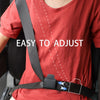 A person wearing a red shirt is shown with a black seat belt adjuster clip visible on their clothing.