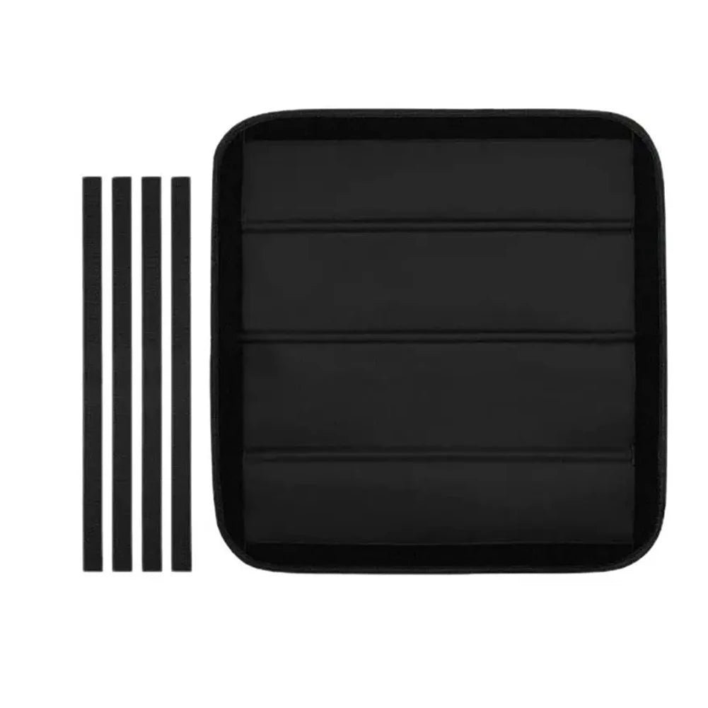 Black foldable RV skylight sunshade with reflective insulation featuring multiple horizontal slats.