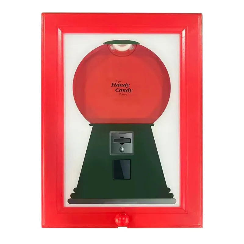 A vintage rotating candy display frame with a red border and a green base.
