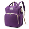 Purple large capacity diaper bag backpack with a beige changing mat visible.