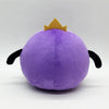 A cute purple plush doll with a golden crown on top.