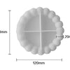 A white silicone tray mold with a fluted edge and a cross-shaped divider, shown with dimension lines.