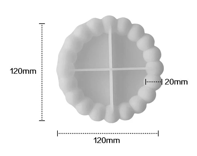 A white silicone tray mold with a fluted edge and a cross-shaped divider, shown with dimension lines.