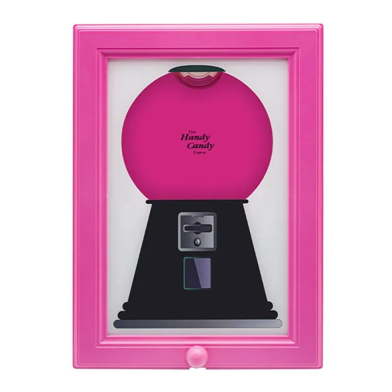 A pink vintage rotating candy display frame with a black base and dust cover.