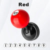 A red billiard ball style car start button cover with a lucky number sticker shown next to its black cap.