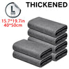 Stack of gray thickened reusable microfiber cleaning cloths folded neatly