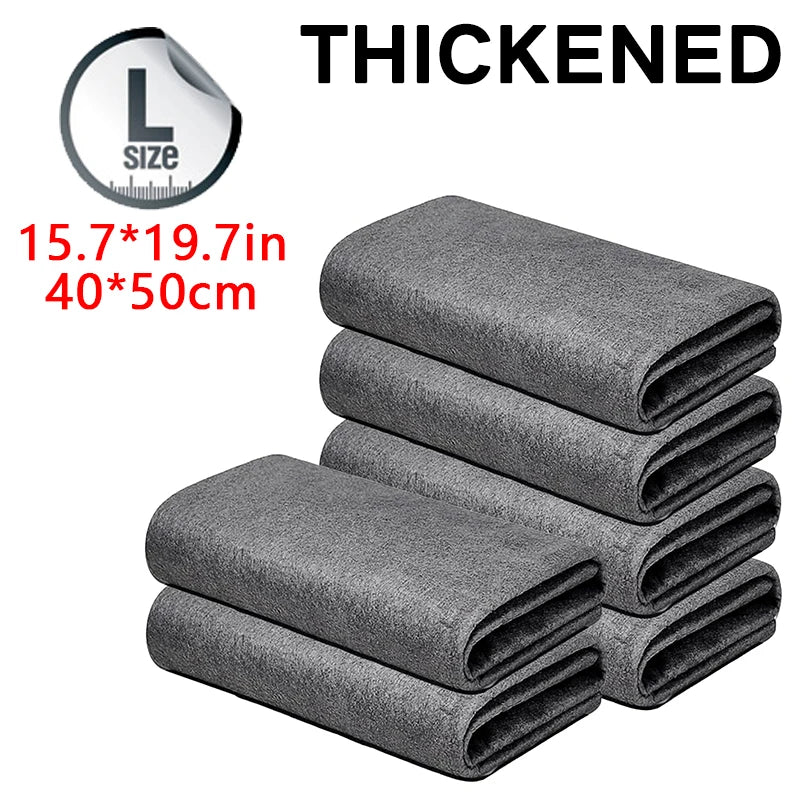 Stack of gray thickened reusable microfiber cleaning cloths folded neatly