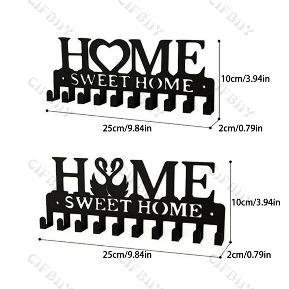Black rustic iron wall hooks shaped like the words HOME SWEET HOME for home organization