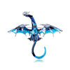 A blue enamel dragon brooch with rhinestone accents, featuring wings and a tail.