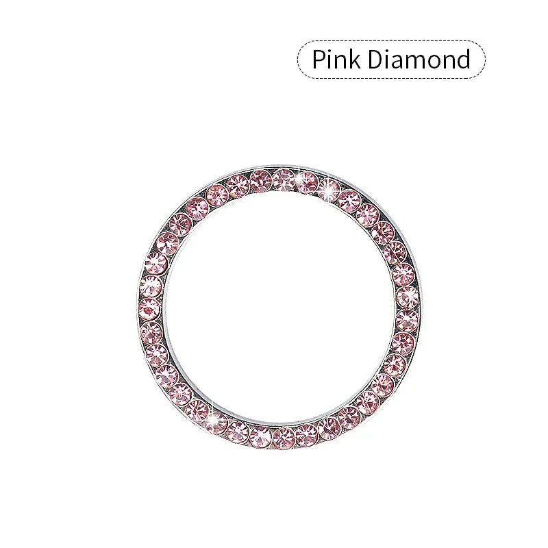 Pink diamond ring with a round band and pave-set stones.