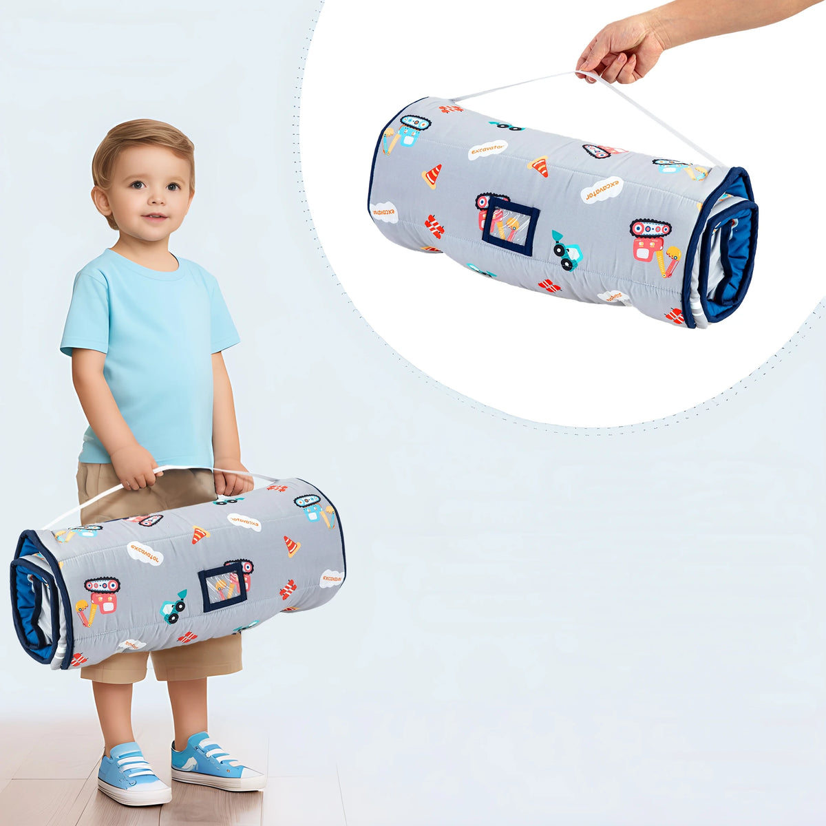 A toddler is holding an all-in-one nap mat with a removable pillow and fleece blanket featuring colorful designs.