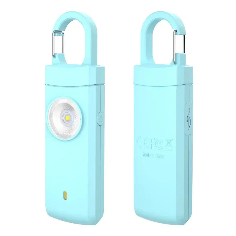 A light blue compact USB rechargeable LED security light with a handle and alarm feature.