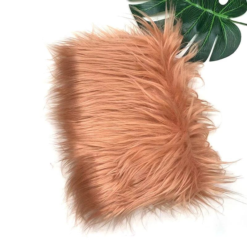 A fluffy, reddish-brown faux fur fabric used for DIY sewing, doll hair, and cosplay.