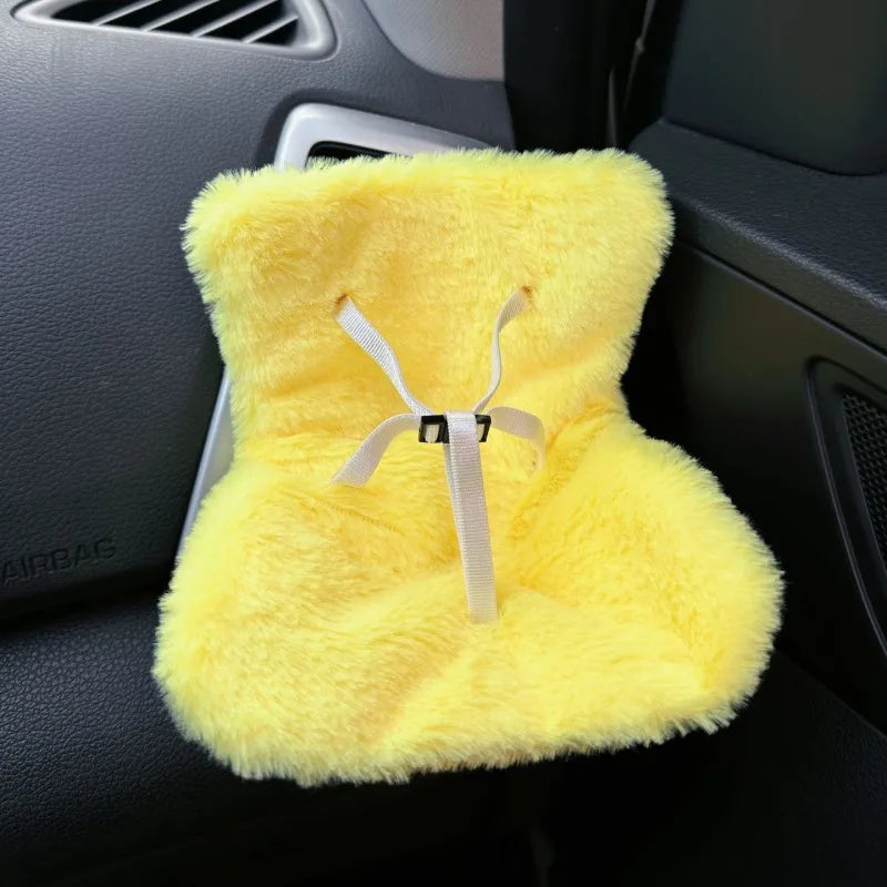 A bright yellow fluffy doll seat car vent decoration with a light beige tie