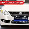 Close-up of a white car's front grille featuring a thin blue line American flag metal sign.