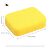 A yellow high-density car wash sponge, approximately 14 cm by 19 cm.