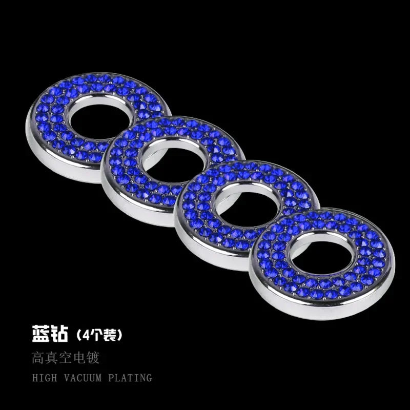 A set of four blue crystal rhinestone car door lock pull covers with silver accents.