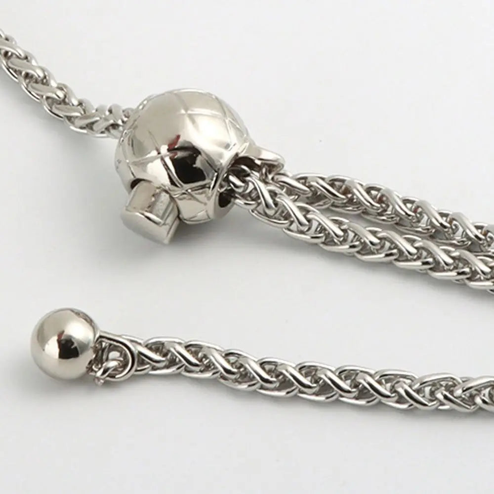Silver metal chain strap with a skull charm for handbags and purses