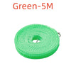 Una carrete de cuerda de nylon verde brillante de 5 metros para secar ropa al aire libre.