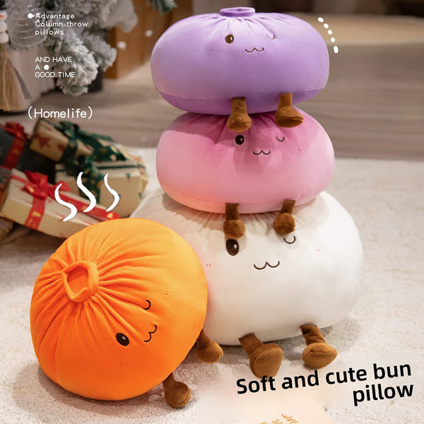 Présentation de coussins en forme de choux doux et mignons dans les couleurs orange, rose et blanc.