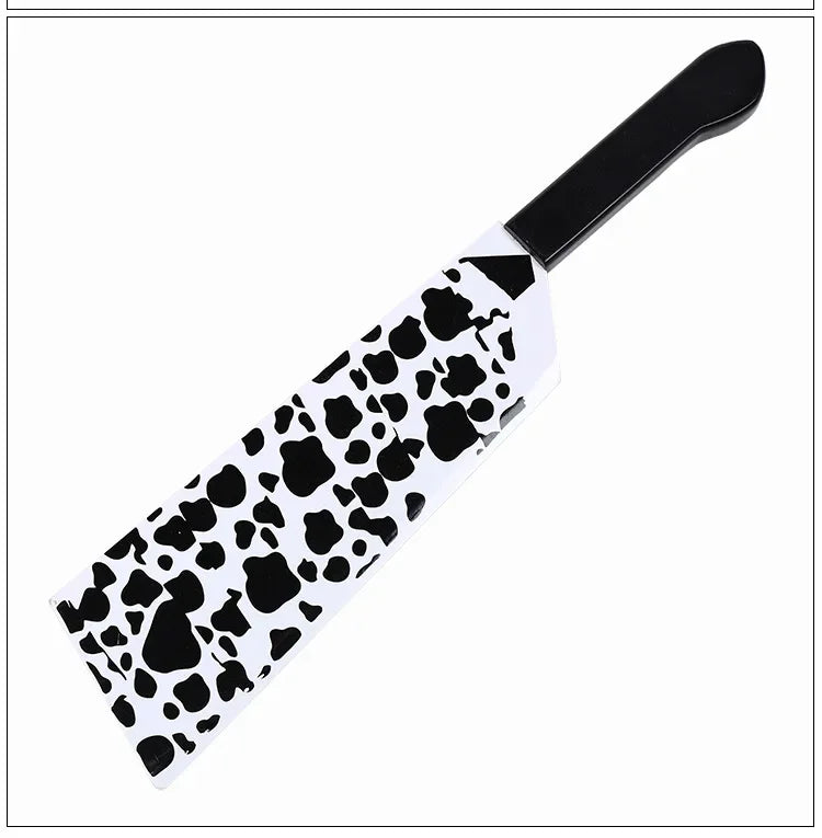 A black and white patterned cosplay katana with a black handle.