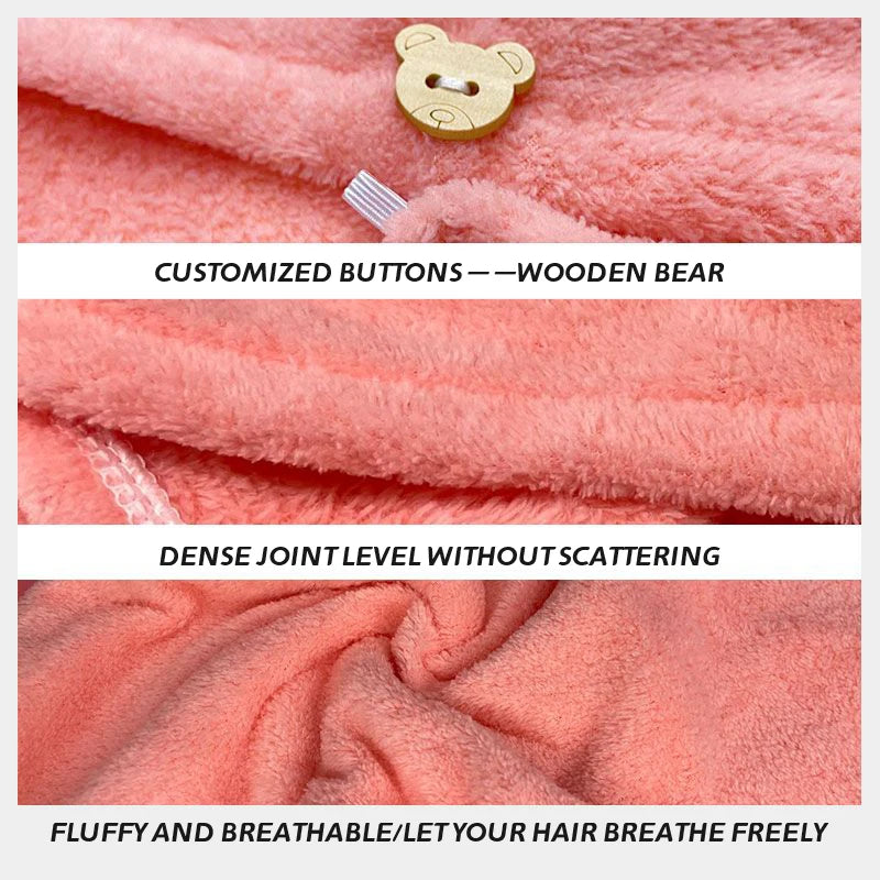 Close-up of a pink fuzzy towel wrap featuring custom wooden bear buttons and dense joint construction.