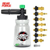 A clear bottle containing snow foam lance accessories and a black foam lance attachment.