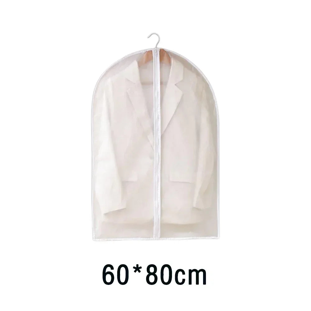 A light beige transparent zippered garment storage bag hanging on a hanger.