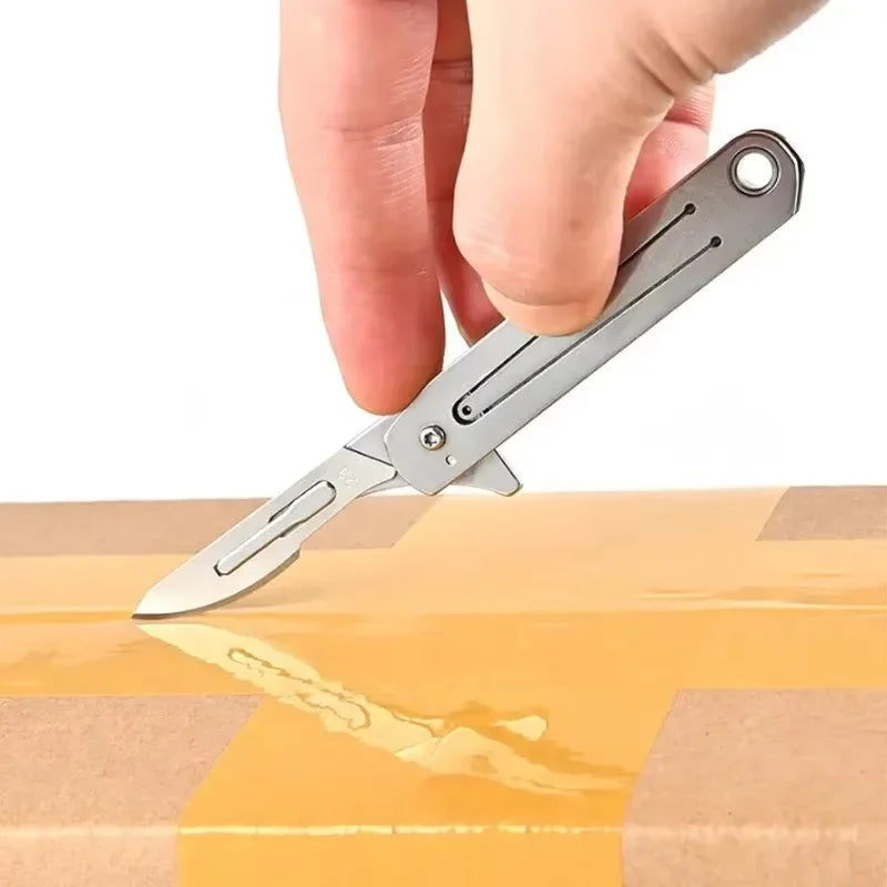 Compact Stainless Steel Folding Knife with Keychain