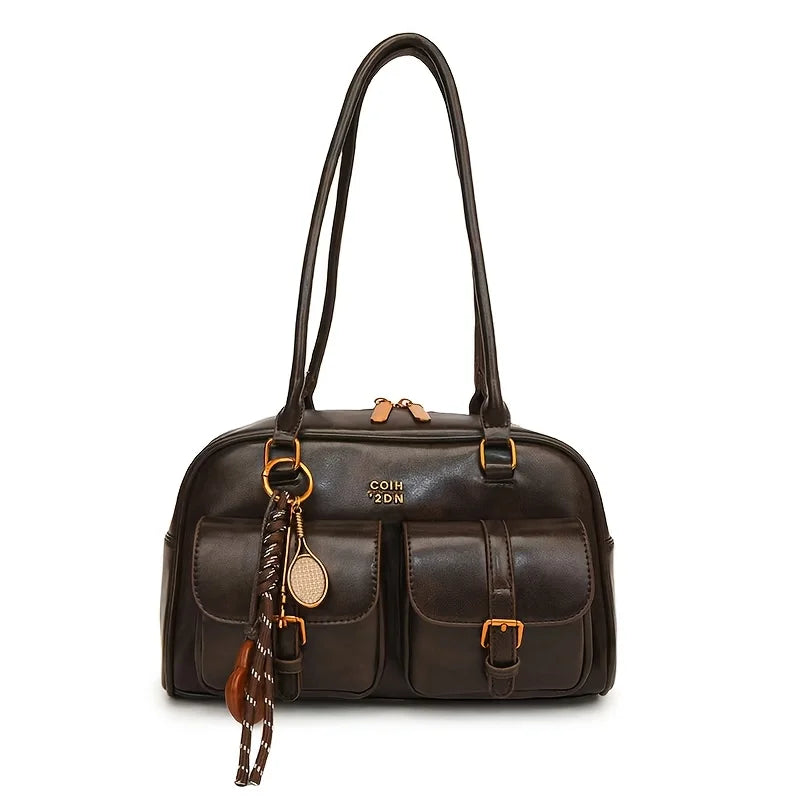Braune Umhängetasche mit mehreren Taschen, Lederbesatz und goldenen Metallbeschlägen.