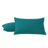 A pair of teal microfiber pillowcases with envelope closure stacked together.