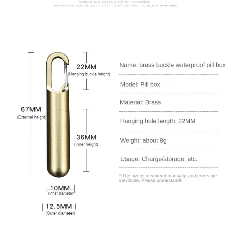 A brass buckle waterproof pill box with a hanging mechanism and keychain attachment.