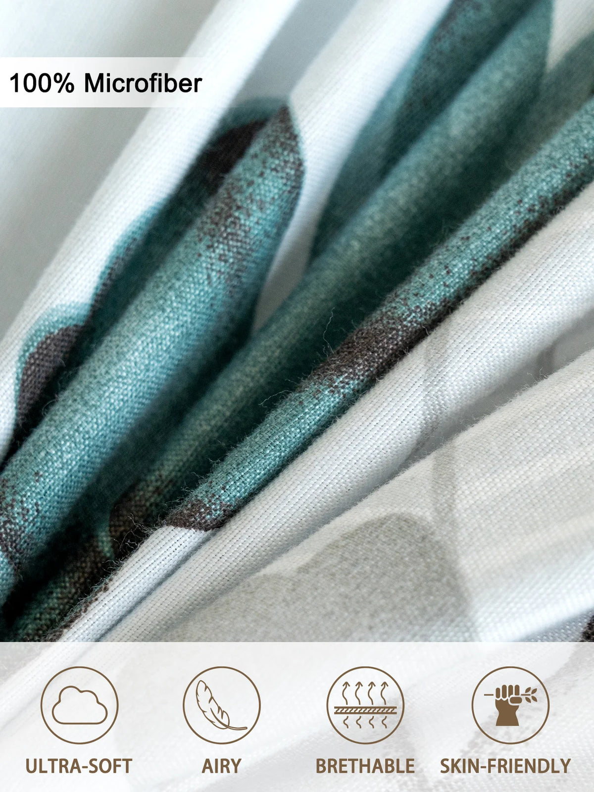 Close-up of a teal and grey watercolor floral microfiber fabric showing its soft texture and breathable qualities.