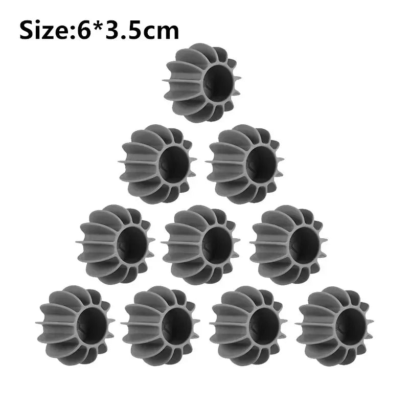 A set of six reusable laundry balls for pet hair and lint removal, dark gray in color.