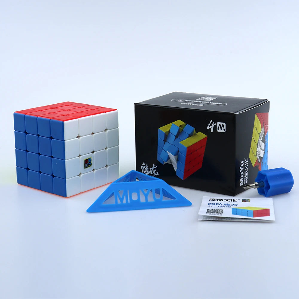A black box containing a MoYu magnetic speed cube set and a blue plastic cube on a white surface.