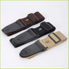 A vintage guitar strap in brown and black leather with a cross pattern and a pick pocket.