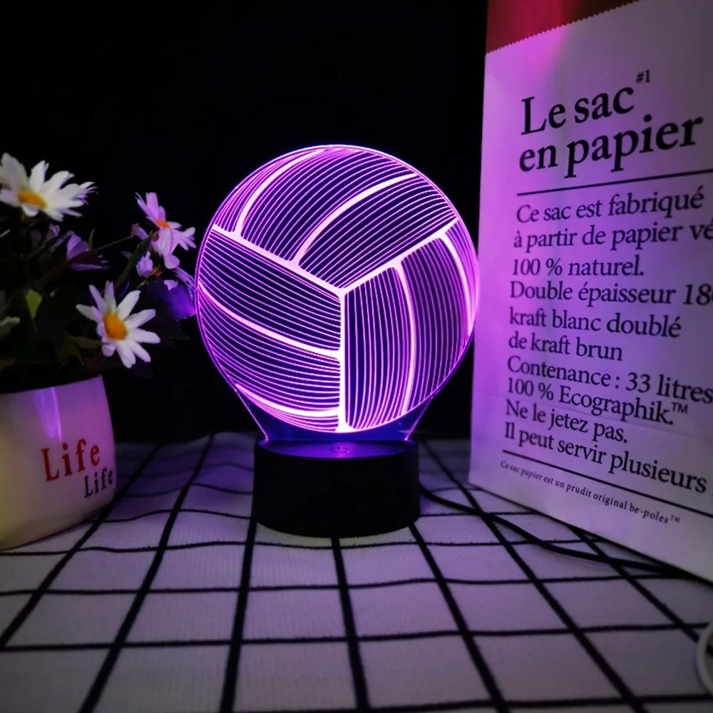 A glowing purple spherical night light shaped like a volleyball sits on a surface next to a product description.