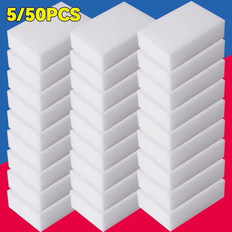 A stack of white melamine sponge cleaning erasers on a red surface.
