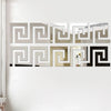 A horizontal decorative mirror featuring repeating geometric borders in silver and black tones.