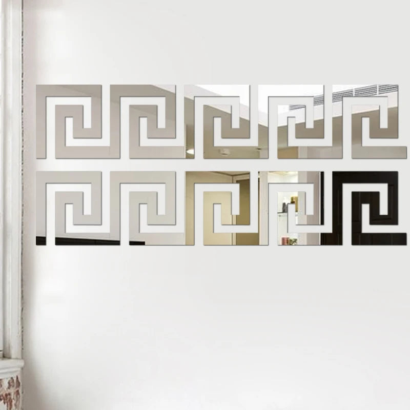 A horizontal decorative mirror featuring repeating geometric borders in silver and black tones.