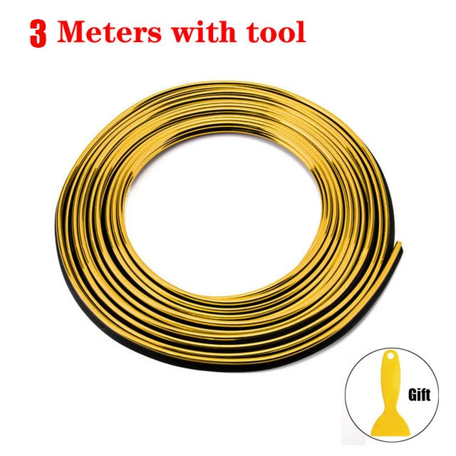 A coil of 3 meters of gold-colored flexible car interior trim strips with a tool.