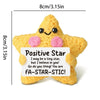 Handmade yellow crochet star animal doll with pink accents and a positive message card