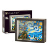 A box and framed print of Van Gogh's Starry Night featuring blue, yellow, and green colors.