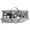 Gray purse organizer insert with multiple compartments and dividers for small items